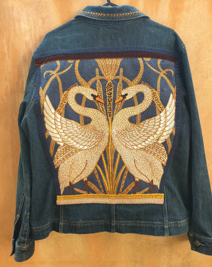 denim jacket with golden swans embroidered